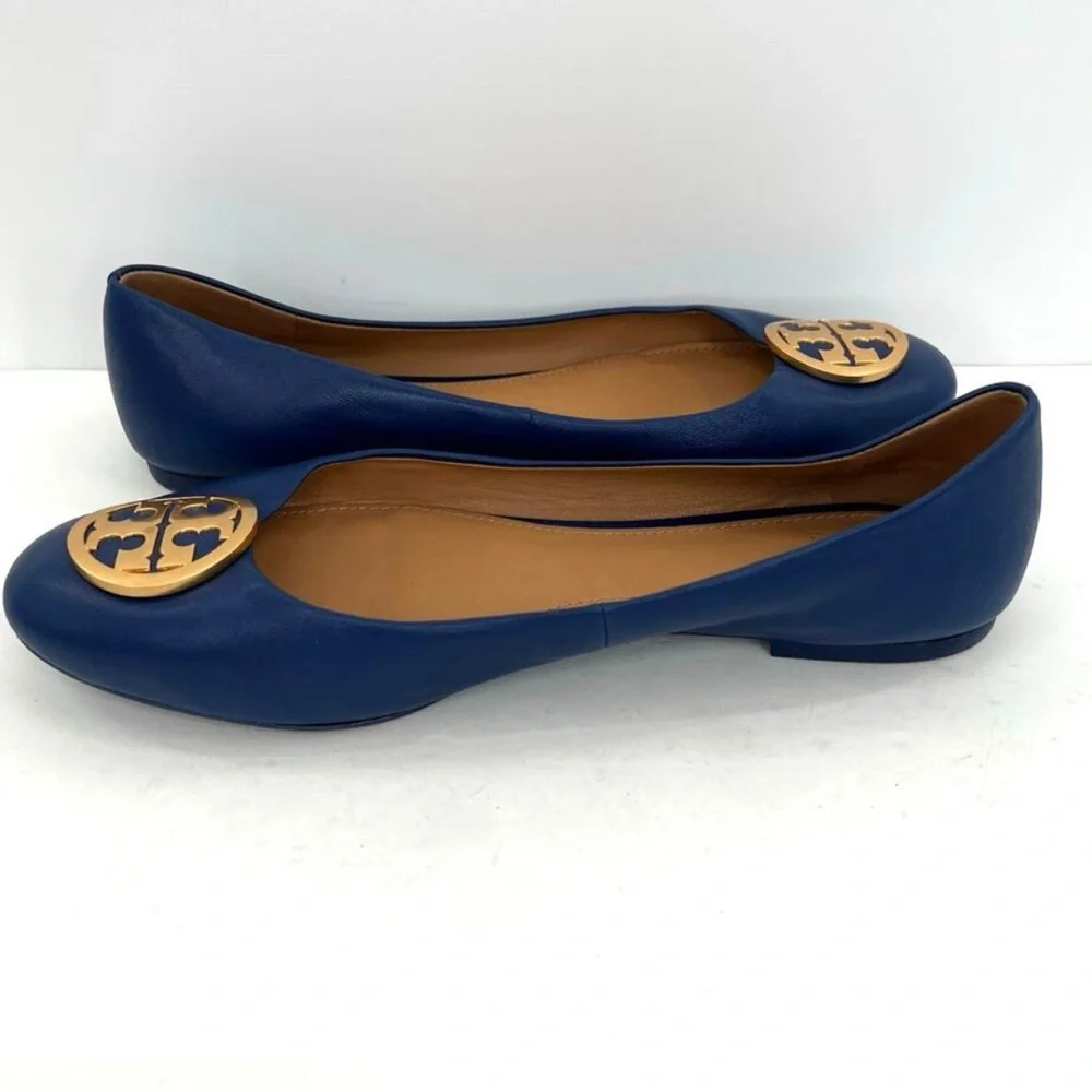 Tory Burch Navy Flats with Gold Emblem - Picture 2 of 10